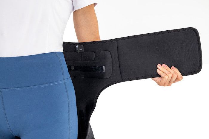 Hip bandage with adjustable articulated stabilizer