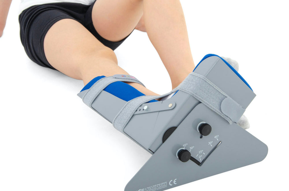 Attelle d'immobilisation du pied-cheville et éventuellement hanche pédiatrique