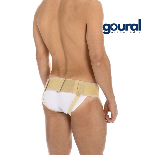 Hernia truss to reduce inguinal hernias with pads