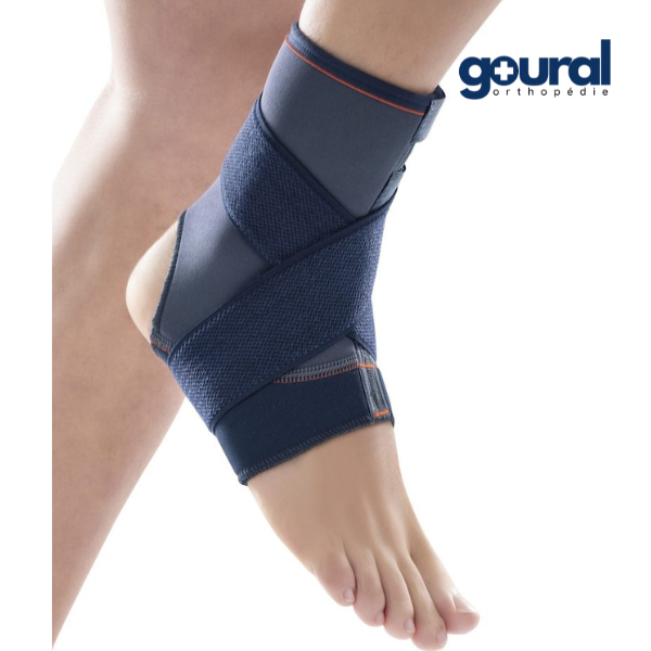 Neoprene ankle brace with eight-point stabilization system using a semi-rigid strap