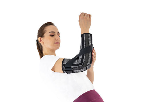 Elbow brace for elbow extension control