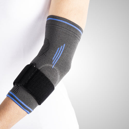 Coudière de maintien avec insert visco-élastique et sangle compressive