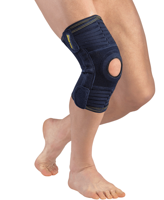 Genouillère ligamentaire réglable évolutive à fenêtre rotulienne