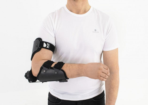 Attelle de coude articulée avec orthèse de main au repos