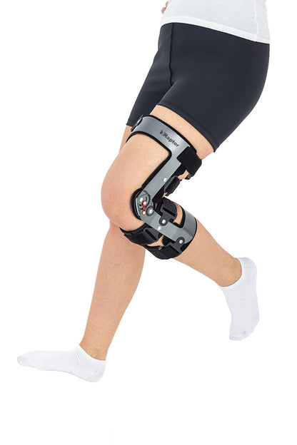 Attelle de genou articulée ROM pour traitement des atteintes du LCA