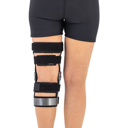 Attelle de genou articulée ROM pour traitement des atteintes du LCA