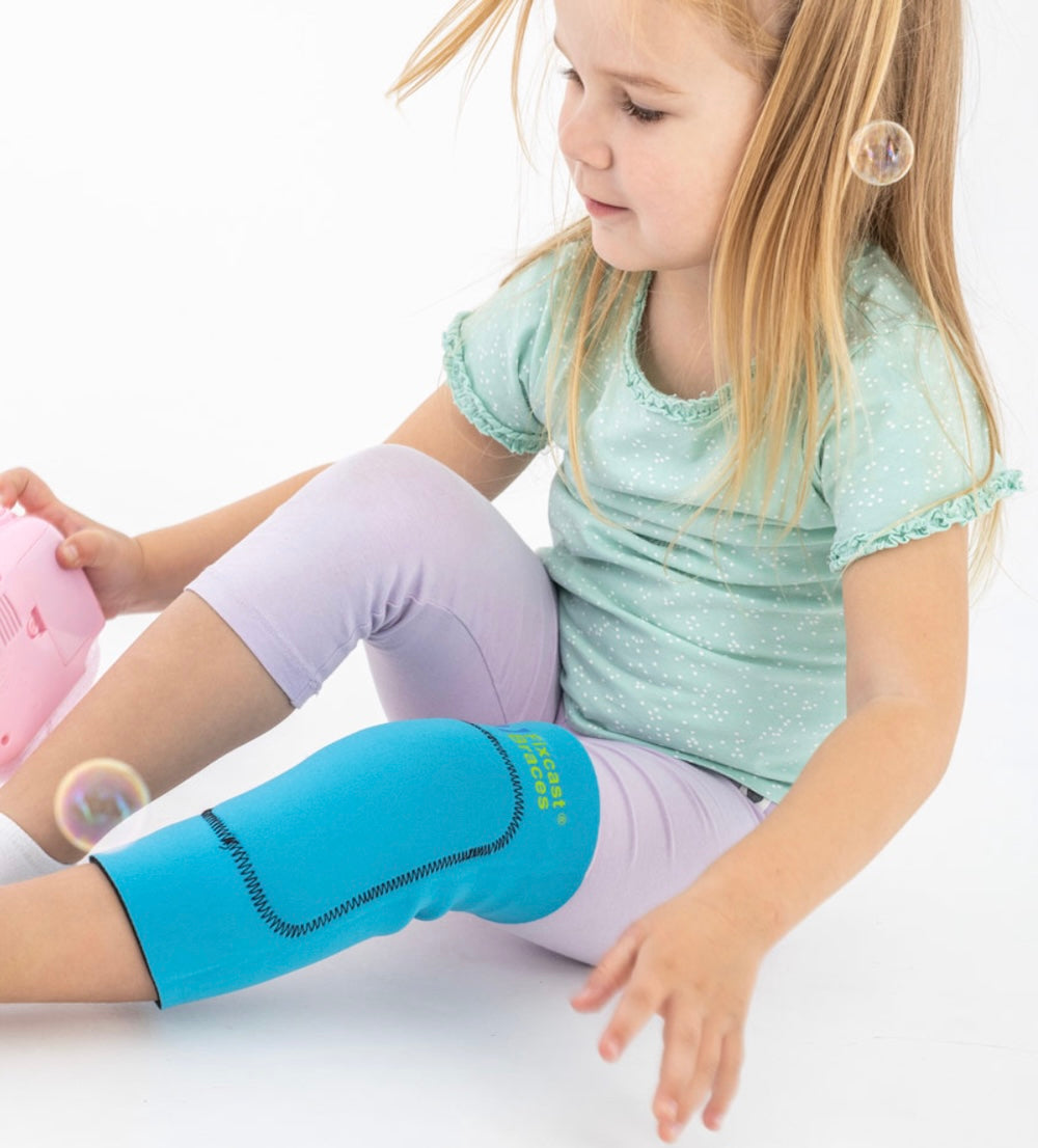 Genouillère de maintien et protection pédiatrique couleur aléatoire