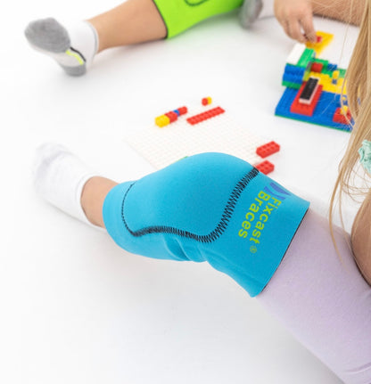 Genouillère de maintien et protection pédiatrique couleur aléatoire