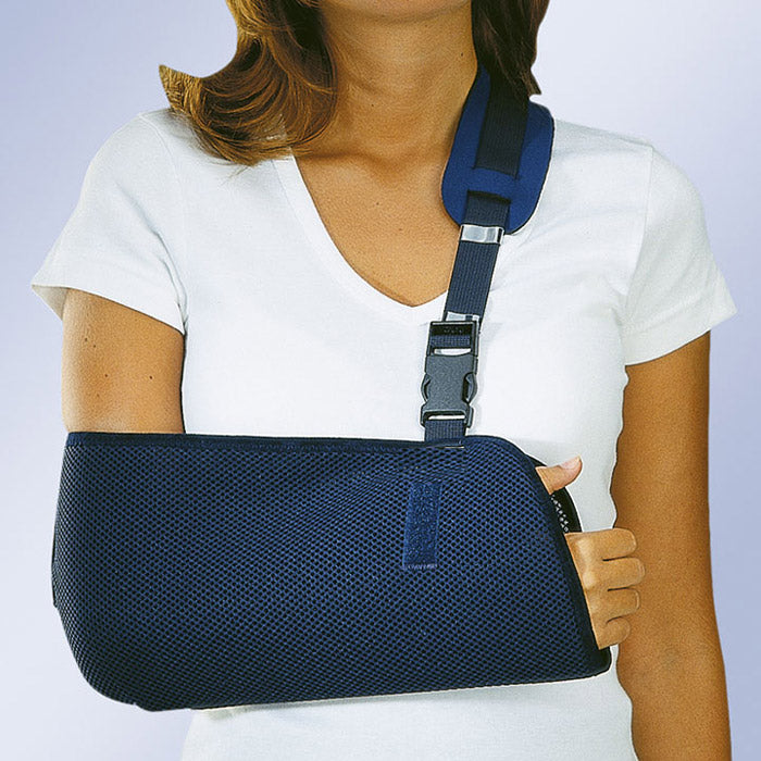 Click-clack shoulder immobilization sling