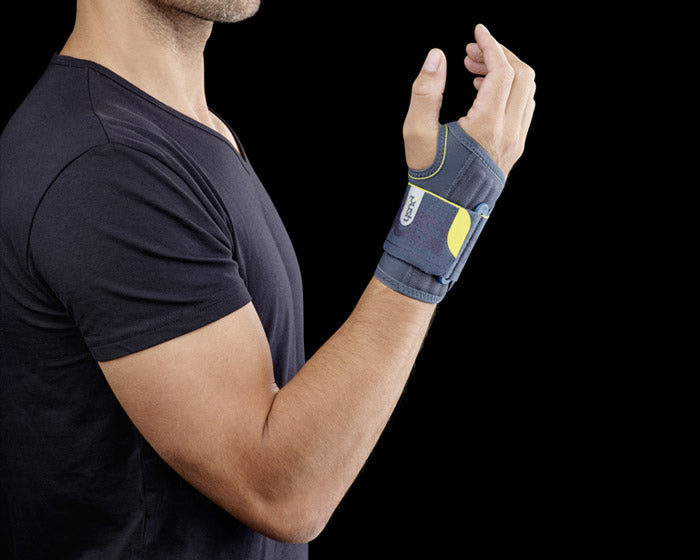 Compression wrist immobilization orthosis for sport